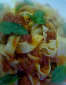 Fresh tagliatelle with tomato pasta sauce